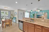 129 NE 13th Street, Oak Island, NC 28465 — 3-bedroom home, Oak Island, NC, photo 10 of 68: Kitchen & Dining Room