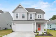 1080 Ben Thomas Drive NE, Leland, NC 28451 — 4-bedroom home in Coastal Haven, Leland, NC, photo 1 of 45: Front Exterior (43)