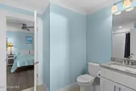 4321 E Beach Drive, Oak Island, NC 28465 — 6-bedroom waterfront home in E. Long Beach, Oak Island, NC, photo 18 of 49: 4-web-or-mls-BTS01851