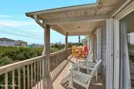 600-A N Anderson Boulevard, Topsail Beach, NC 28445 — 4-bedroom waterfront home in Topsail Beach, Topsail Beach, NC, photo 16 of 42: Oceanside Deck, Top Floor