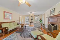 1321 Marsh Line Court SW, Shallotte, NC 28470 — 3-bedroom waterfront home in Marsh Cove, Shallotte, NC, photo 11 of 75: Pinewood Flooring in Living Space
