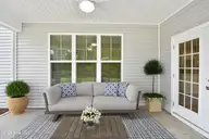 1034 Paddington Avenue NE, Leland, NC 28451 — 5-bedroom home in Parkwood Estates, Leland, NC, photo 13 of 23: 12 screened porch