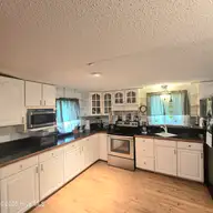 206 Holden Road, Holly Ridge, NC 28445 — 3-bedroom manufactured home, Holly Ridge, NC, photo 10 of 30: Kitchen 2