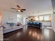 7830 Champlain Drive, Wilmington, NC 28412 — 5-bedroom waterfront home in Woodlake, Wilmington, NC, photo 10 of 42: Kitchen & Living Room