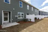 4330 Majesty Drive Unit 355, Castle Hayne, NC 28429 — 3-bedroom townhome in Sidbury Station, Castle Hayne, NC, photo 20 of 36: Back of Townhomes