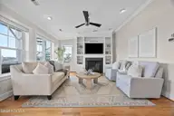 130 Heather Lane, Kure Beach, NC 28449 — 5-bedroom waterfront home in Kure Estates, Kure Beach, NC, photo 20 of 67: living room 2