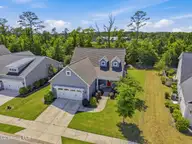 5732 Brown Pelican Lane, Wilmington, NC 28409 — 4-bedroom home in Kaylies Cove, Wilmington, NC, photo 2 of 38: 34_front right aerial