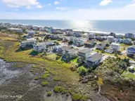 1020 W Pelican Drive, Oak Island, NC 28465 — 3-bedroom waterfront home in W. Long Beach, Oak Island, NC, photo 11 of 47: 1020 W Pelican