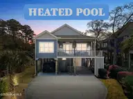 314 NE 61st Street, Oak Island, NC 28465 — 3-bedroom home in Tranquil Harbor, Oak Island, NC, photo 1 of 70: 3-web-or-mls-cammediallc.com (13 of 67)