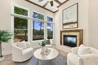 70 Royal Dublin Downs, Pinehurst, NC 28374 — 4-bedroom waterfront home in National, Pinehurst, NC, photo 16 of 53: Family Room with golf & water views