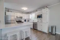 108 Hoffman Beach Road, Salter Path, NC 28512 — 3-bedroom waterfront home, Salter Path, NC, photo 19 of 42: Kitchen Bar2