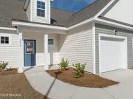 214 Sandpiper Place, Holly Ridge, NC 28445 — 3-bedroom townhome in Coastal Village, Holly Ridge, NC, photo 2 of 21: 212-214 Sandpiper - Exterior - Edited_8