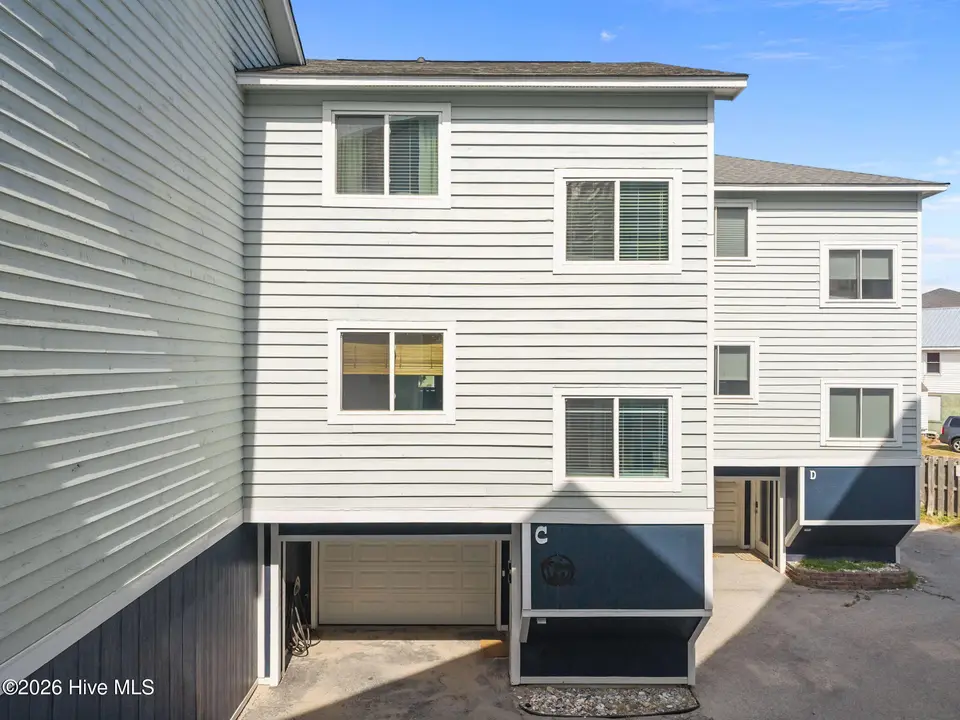 1412 Canal Drive Apt C, Carolina Beach, NC 28428 — 2-bedroom waterfront condo, Carolina Beach, NC, photo 1 of 41: 2-web-or-mls-DJI_20260413153817_0711_D