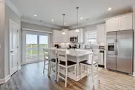 208 Goldsboro Drive, North Topsail Beach, NC 28460 — 6-bedroom waterfront townhome in Topsail Wynds, North Topsail Beach, NC, photo 16 of 51: kitchen2
