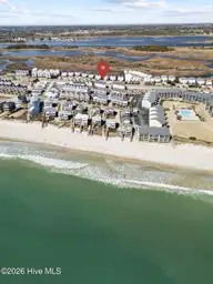 828 /102 N New River Drive 102, Surf City, NC 28445 — 4-bedroom waterfront townhome in Carolina Shores, Surf City, NC, photo 3 of 39: 41-web-or-mls-DJI_20260224111349_0960_D