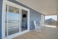 209 W Beach Drive, Oak Island, NC 28465 — 5-bedroom waterfront home in W. Long Beach, Oak Island, NC, photo 20 of 60: 209 W Beach Drive 25