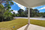 240 Cline Way Unit 125, Beaufort, NC 28516 — 3-bedroom townhome in 1809 Live Oak, Beaufort, NC, photo 14 of 37: Covered Back Porch