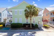 215 Silver Sloop Way, Carolina Beach, NC 28428 — 3-bedroom waterfront townhome in Harbour Point, Carolina Beach, NC, photo 1 of 52: 01-FinalDroneJonathanCB