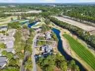 8815 10 Carenden Court, Sunset Beach, NC 28468 — waterfront lot in Thistle Downs, Sunset Beach, NC, photo 5 of 22: DJI_0030 copy
