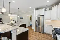 6988 Ascension Drive SW, Ocean Isle Beach, NC 28469 — 3-bedroom home in Sunset Ridge, Ocean Isle Beach, NC, photo 13 of 37: Perfect kitchen layout