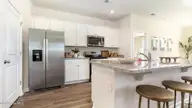 1204 Sandy Heights Loop Lot 145, Navassa, NC 28451 — 3-bedroom home in Cedar Hill Landing, Navassa, NC, photo 12 of 34: Kitchen