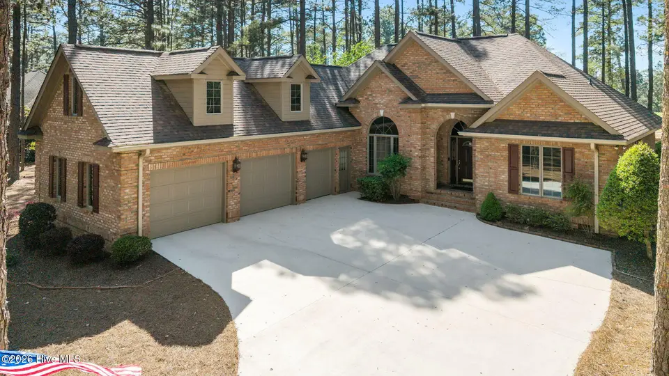28 Abbottsford Drive, Pinehurst, NC 28374 — 3-bedroom home in Pinewild CC, Pinehurst, NC, photo 1 of 51: 6-web-or-mls-DJI_20260416160727_0449_D