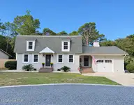 32 Yaupon Way, Oak Island, NC 28465 — 3-bedroom home in Oak Island Estates, Oak Island, NC, photo 1 of 2: ChatGPT Image Oct 14, 2026 at 10_06_48 A