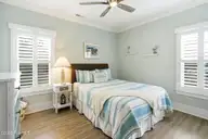 202 NE 64th Street, Oak Island, NC 28465 — 3-bedroom home, Oak Island, NC, photo 14 of 49: Guest bedroom 1