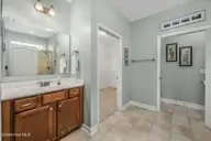 2050 Lindrick Court NW, Calabash, NC 28467 — 3-bedroom home in Spring Mill, Calabash, NC, photo 12 of 32: 51-web-or-mls-40 back left bathroom