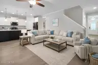 405 Antioch Lakes Road, New Bern, NC 28560 — 3-bedroom waterfront home in The Lakes at Antioch, New Bern, NC, photo 18 of 54: AI living room