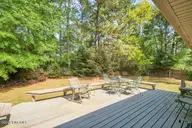 32 Bogie Drive, Whispering Pines, NC 28327 — 3-bedroom home in Whispering Pines, Whispering Pines, NC, photo 13 of 63: 14-18_32 Bogie Dr., WP_Exterior_Spring_L