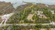 10022 Coast Guard Road, Emerald Isle, NC 28594 — waterfront lot in Deer Run, Emerald Isle, NC, photo 2 of 15: 16-web-or-mls-DJI_0881_1