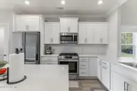 177 Tilloo Cut Way, Hampstead, NC 28443 — 4-bedroom waterfront home in Sanctuary at Forest Sound, Hampstead, NC, photo 18 of 61: 21-web-or-mls-GI - 177 Tilloo Cut Way -