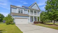 13009 Bending River Way, Leland, NC 28451 — 4-bedroom waterfront home in Hawkeswater at the River, Leland, NC, photo 2 of 69: 13009_bending_river_wy_002