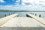 208 Coastline Circle, Cedar Point, NC 28584 — 4-bedroom waterfront home in Bridge View, Cedar Point, NC, photo 8 of 66: 56-web-or-mls-Bridge View Boat Ramp-3