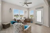 9414 Barnstormer Drive, Carolina Shores, NC 28467 — 3-bedroom waterfront home in Eagle Run, Carolina Shores, NC, photo 17 of 41: Carolina Room