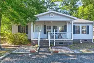 214 Dogwood Drive, Sunset Beach, NC 28468 — 3-bedroom manufactured home in Seaside Station, Sunset Beach, NC, photo 1 of 34