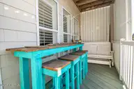1700 Salter Path Road K-102, Indian Beach, NC 28512 — 2-bedroom waterfront condo in The Ocean Club, Indian Beach, NC, photo 11 of 45: Covered Deck