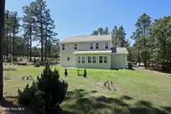 39 Forest Lake Drive, Jackson Springs, NC 27281 — 4-bedroom home in Foxfire Village East, Jackson Springs, NC, photo 6 of 49: 6 Back of home
