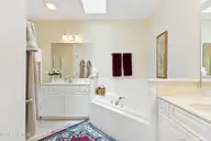 1194 Andora Drive SE Unit 9, Bolivia, NC 28422 — 3-bedroom townhome in Palmetto Creek, Bolivia, NC, photo 23 of 57: Dual vanities and soaking tub