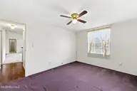 989 Simpson Ditch Road, Elizabeth City, NC 27909 — 3-bedroom manufactured home in Pine Meadows, Elizabeth City, NC, photo 21 of 36: Bedroom 2