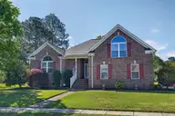 1113 Willow Pond Lane, Leland, NC 28451 — 4-bedroom home in Magnolia Greens, Leland, NC, photo 1 of 73: Front Exterior