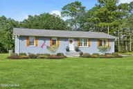 136 Park Avenue, Southport, NC 28461 — 3-bedroom home, Southport, NC, photo 2 of 47: Charming blue ranch with vibrant garden