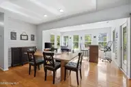 218 Lake Arthur Drive, Newport, NC 28570 — 3-bedroom waterfront home in Lake Arthur Estates, Newport, NC, photo 11 of 39: Dining and Sunroom