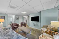 5419 W Beach Drive, Oak Island, NC 28465 — 7-bedroom waterfront home, Oak Island, NC, photo 24 of 69: 23_family room