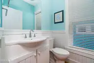237 Sea Dreams Drive, Atlantic Beach, NC 28512 — 2-bedroom waterfront home in Sea Dreams, Atlantic Beach, NC, photo 22 of 71: Half Bath View