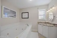 102 Diann Drive A2, Emerald Isle, NC 28594 — 2-bedroom condo in Ocean Reef, Emerald Isle, NC, photo 15 of 40: Primary Bathroom