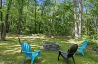 129 Albert Drive, Goldsboro, NC 27530 — 3-bedroom home in The Reach, Goldsboro, NC, photo 5 of 14: Stack-stone Firepit