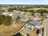107 Cormorant Drive, Swansboro, NC 28584 — 4-bedroom home in Halls Creek North, Swansboro, NC, photo 14 of 52: 12-web-or-mls-DJI_20260318101005_0843_D
