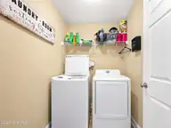 1660 Cedar Point Circle, Elizabeth City, NC 27909 — 3-bedroom home in Hunters Lake, Elizabeth City, NC, photo 17 of 21: Laundry
